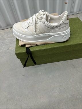 Gucci women’s Cream/White Platform Sneakers